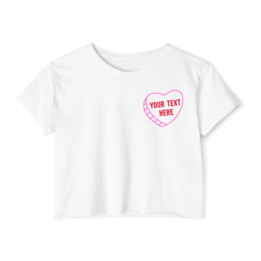 White t-shirt with a pink heart-shaped design and 'Your Text Here' text in the conversation heart.