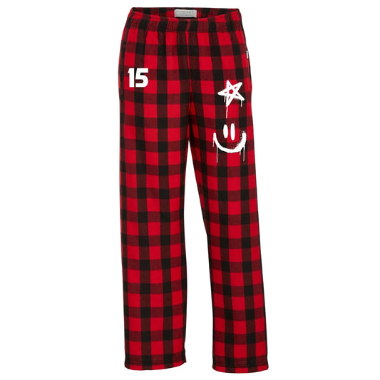 Red and black plaid pants with a smiley face, a star and number 15 