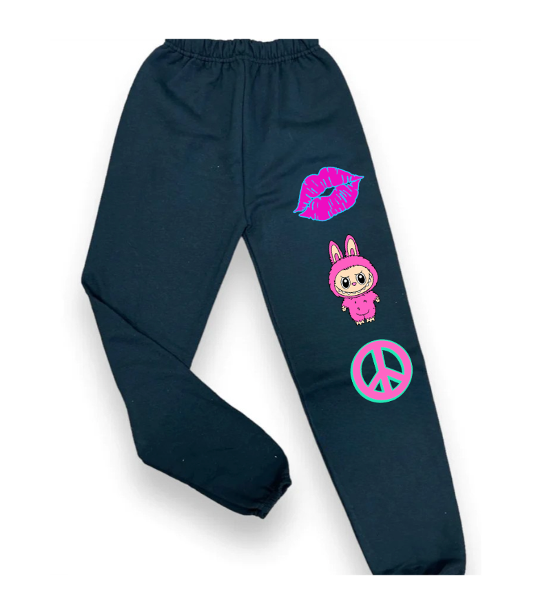 Black custom sweatpants with pink lips graphic, cute pink bunny character, and teal peace sign.